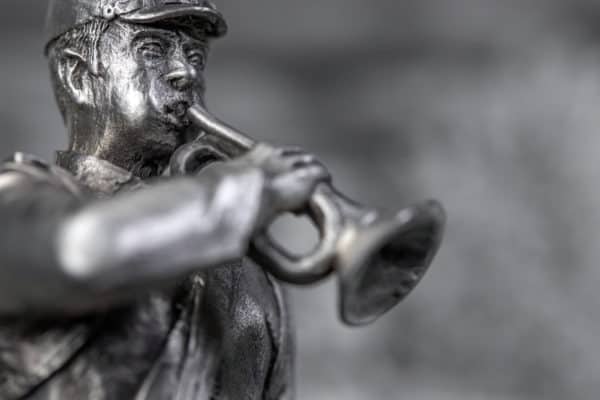 Arlington statue of bugler playing taps